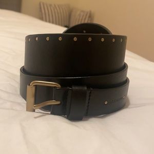 Black waist leather belt, with metal studs detail.